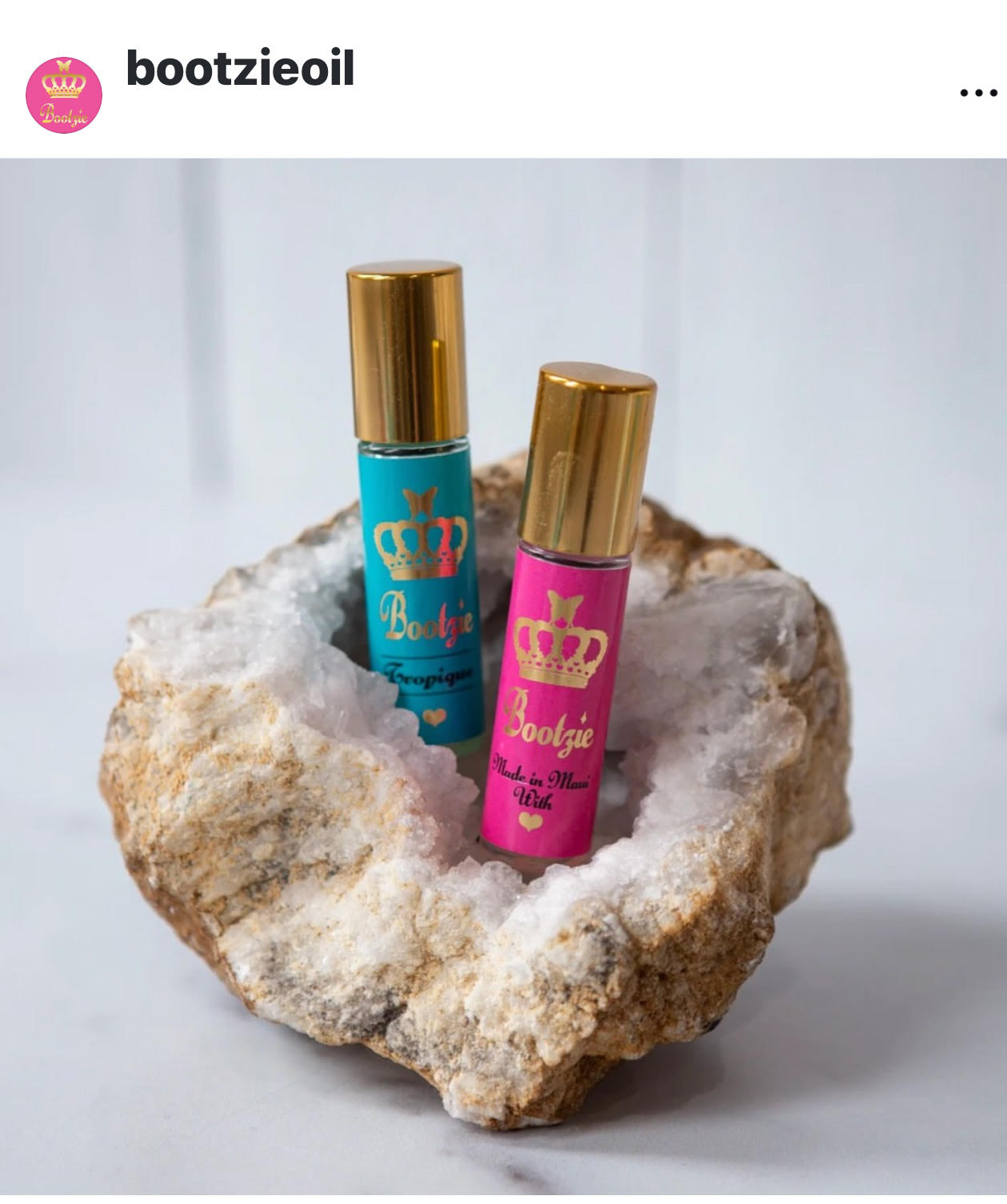 Bootzie perfume oil worn as a colorful island accessory